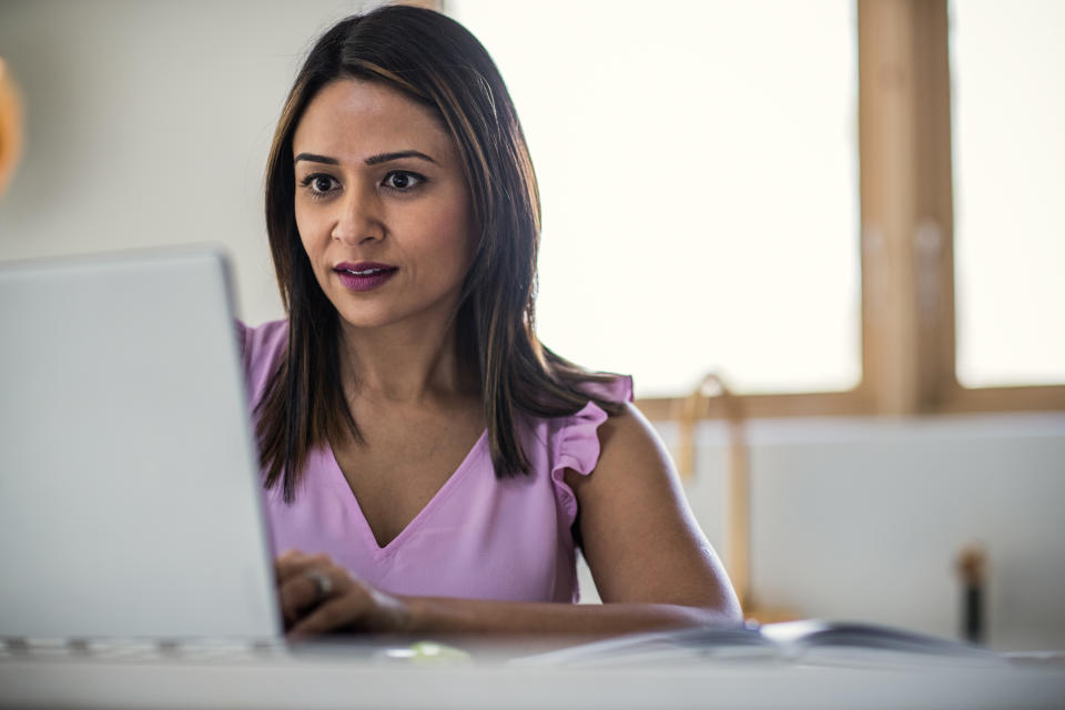 Scammers usually trick people into giving up personal information like their social security number or credit card information. (Photo: Getty)