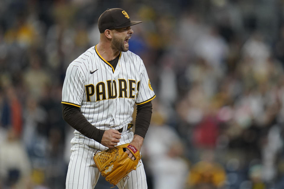 San Diego Padres relief pitcher Nick Martinez reacts after getting the last out in the ninth inning of a baseball game against the San Francisco Giants, Tuesday, Oct. 4, 2022, in San Diego. The Padres won, 6-2. (AP Photo/Gregory Bull)