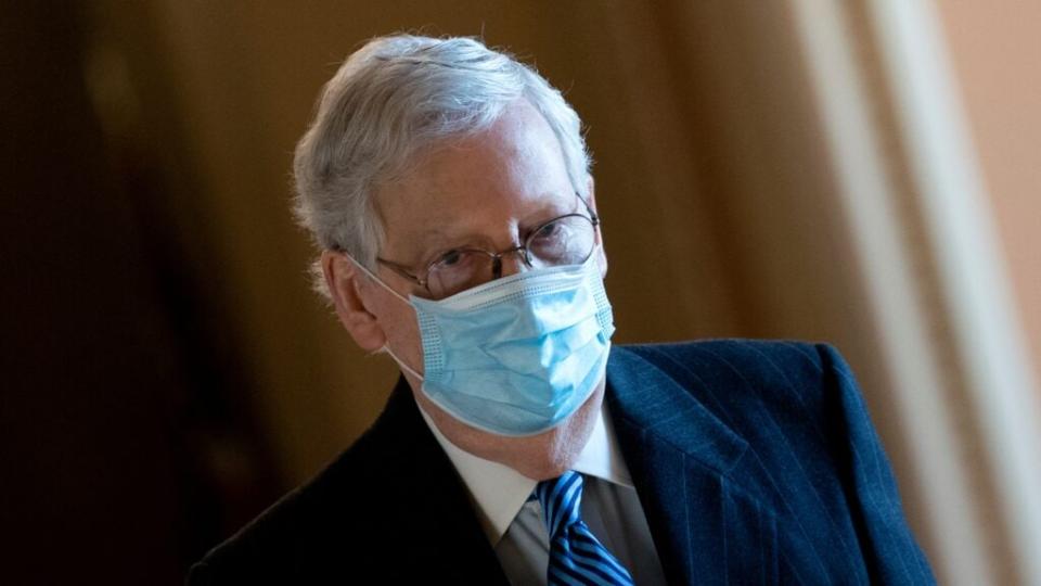 Senate Majority Leader Mitch McConnell walks to the Senate floor on Capitol Hill. (Photo by Stefani Reynolds/Getty Images)