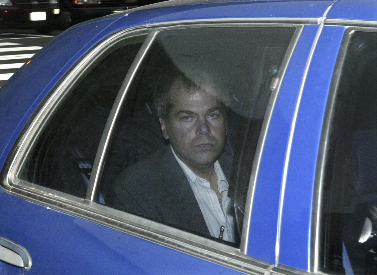 In this Nov. 18, 2003, file photo, John Hinckley Jr. arrives at U.S. District Court in Washington. 