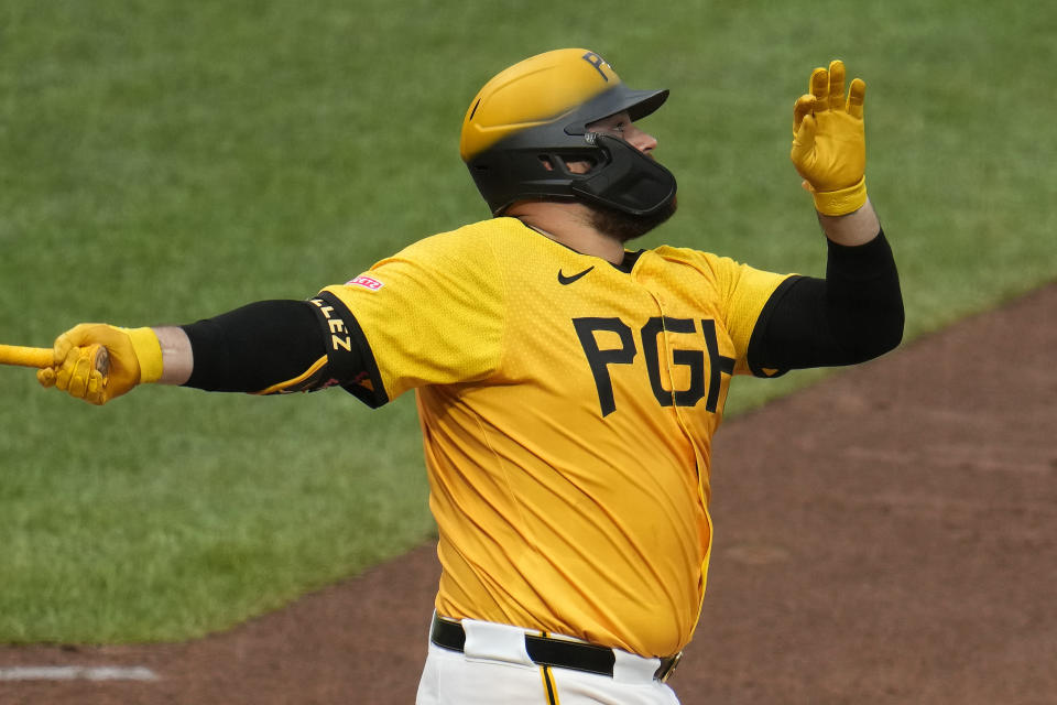 Pittsburgh Pirates' Rowdy Tellez watches his grand slam off New York Mets relief pitcher Ty Adcock during the eighth inning of a baseball game in Pittsburgh, Friday, July 5, 2024. (AP Photo/Gene J. Puskar)