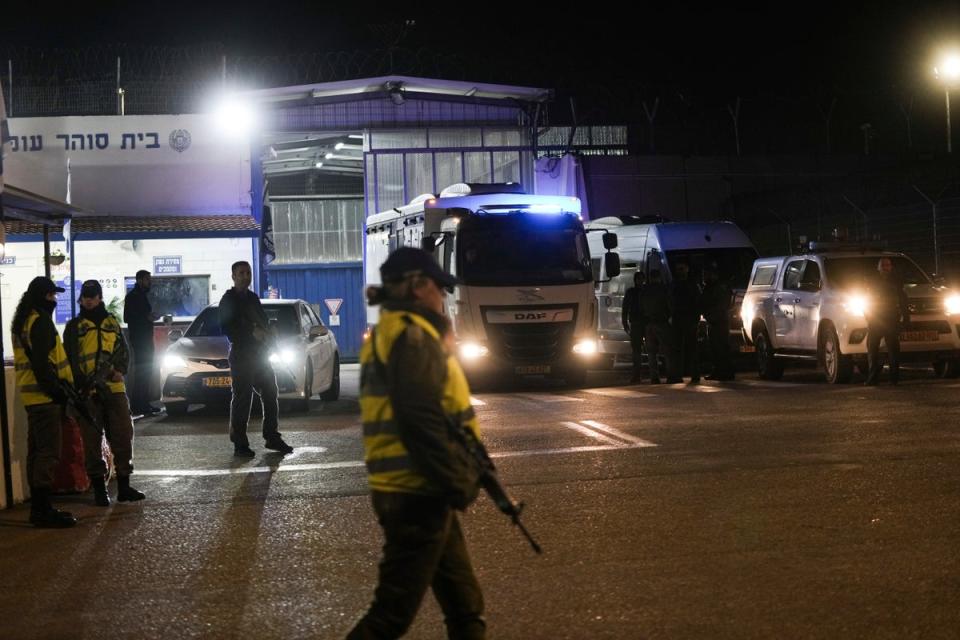 An Israeli prison transport vehicle carries Palestinian prisoners (AP)