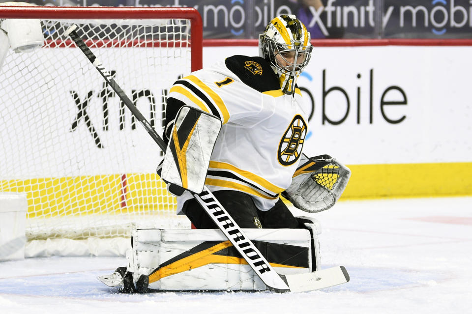 Boston Bruins goaltender Jeremy Swayman makes pad save on a shot during the first period of an NHL hockey game against the Philadelphia Flyers, Tuesday, April 6, 2021, in Philadelphia. (AP Photo/Derik Hamilton)