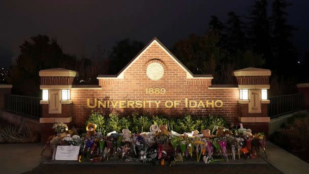 PHOTO: Flowers and other items are displayed at a growing memorial in front of a campus entrance sign for the University of Idaho, Wednesday, Nov. 16, 2022, in Moscow, Idaho. (Ted S. Warren/AP)