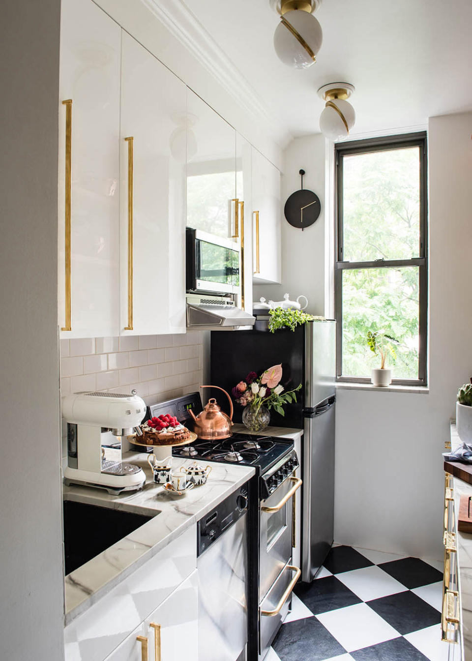 Natasha revamped her tiny kitchen with marble-like, heat-resistant countertops thanks to a collaboration with Oregon-based Stone Coat Countertops. “I reached out to the company, and they loved what I was doing and flew in to make me this countertop,” she says.