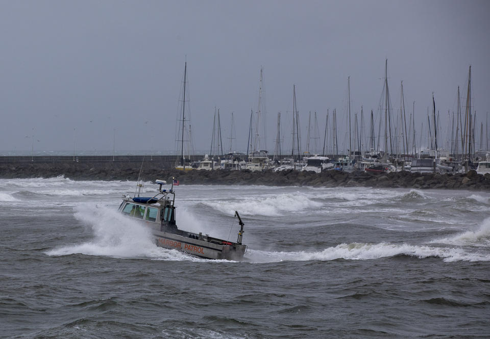 SANTA BARBARA, CA-FEBRUARY 24, 2023: Members of the Harbor Patrol head out into choppy waters, as seen from Stearns Wharf, the result of a powerful storm making its way through Southern California. (Mel Melcon / Los Angeles Times via Getty Images)