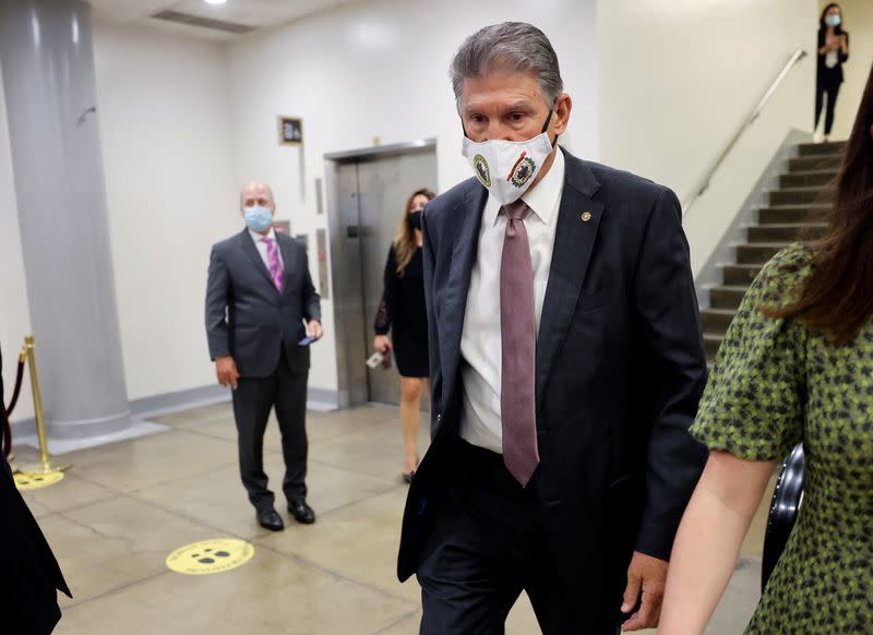 U.S. Senator Joe Manchin enters Senate subway on Capitol Hill in Washington