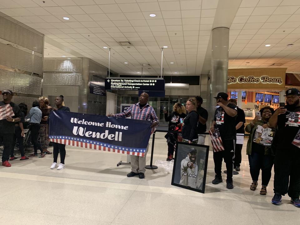 Family and friends await the arrival of Wendell Brown at the Detroit Metropolitan Wayne County Airport. (Dan Wetzel/Yahoo Sports)