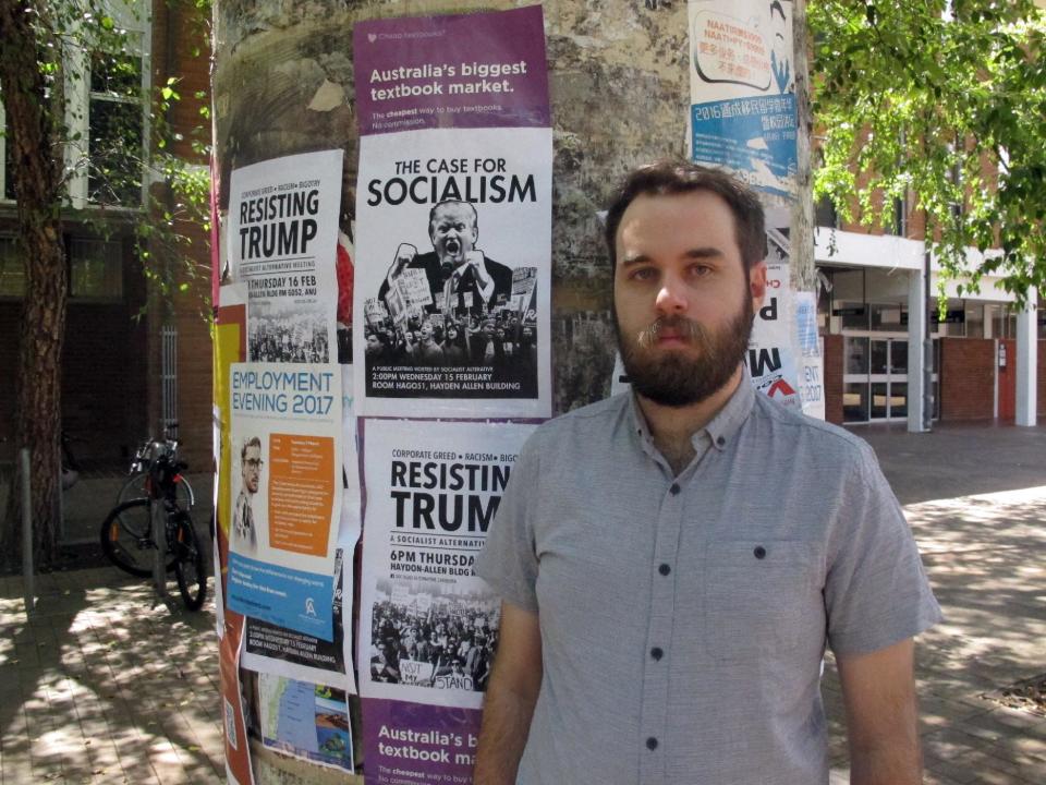In this Feb. 17, 2017 photo, Dominic Nelson, an Australian National University science student, poses for a photo at the university in Canberra, Australia. Some Australians foresee trouble in their country's traditionally strong alliance with the United States because of "un-presidential" behavior from President Donald Trump, while others think outspoken businessman-turned-Australian leader Malcolm Turnbull is a good match for him. (AP Photo/Rod McGuirk)