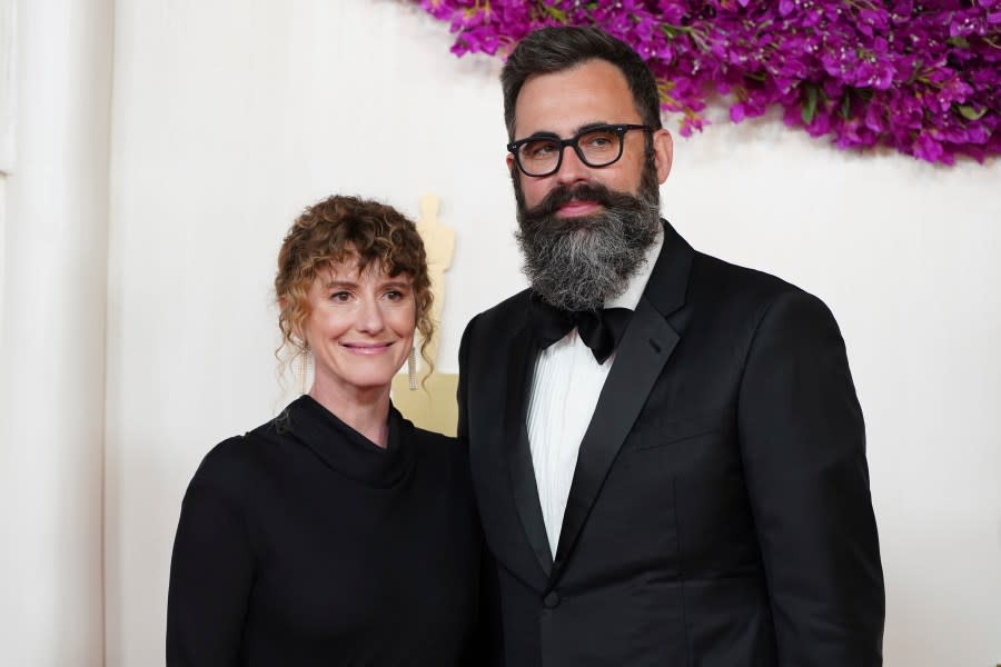 Jerusha Hess, left, and Jared Hess arrive at the Oscars on Sunday, March 10, 2024, at the Dolby Theatre in Los Angeles. (Photo by Jordan Strauss/Invision/AP)