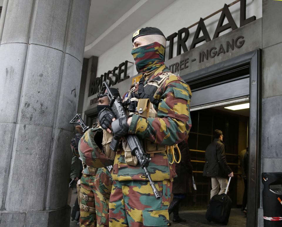 Police control the access to the central train station following Tuesday's bomb attacks in Brussels, Belgium, March 23, 2016. REUTERS/Francois Lenoir