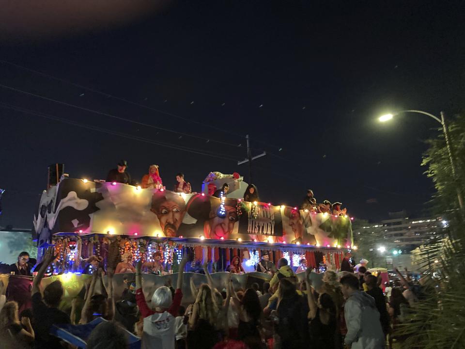 A float rolls down the street as part of the Krewe of Boo parade on Saturday, Oct. 23, 2021, in New Orleans. (AP Photo/Rebecca Santana)