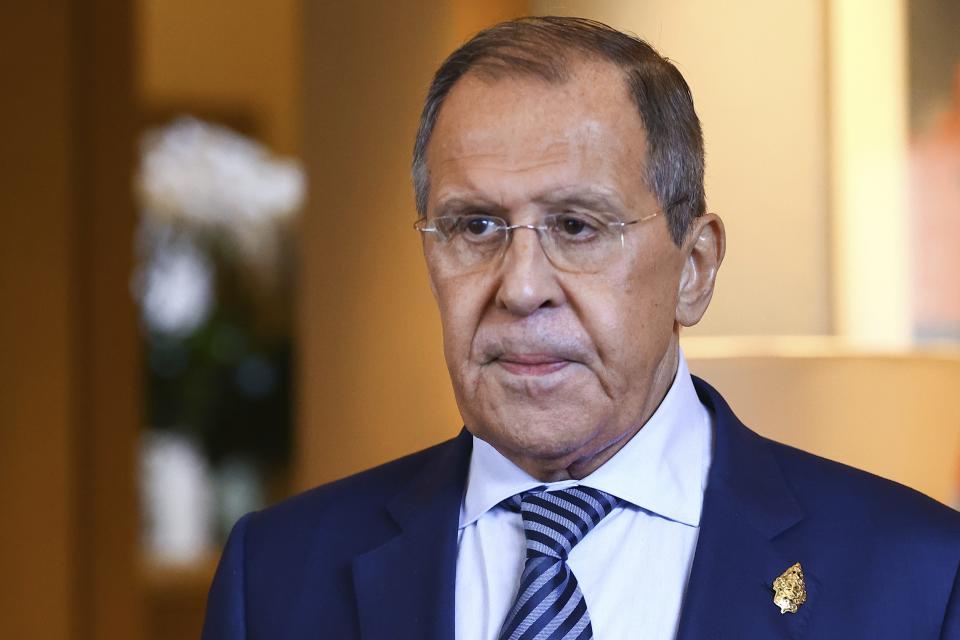 In this handout photo released by Russian Foreign Ministry Press Service, Russian Foreign Minister Sergey Lavrov speaks to Russian journalists after his meetings on sidelines of the G20 summit in Nusa Dua, Indonesia, Tuesday, Nov. 15, 2022. (Russian Foreign Ministry Press Service via AP)