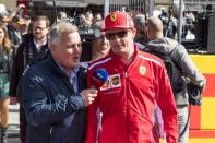 Oct 21, 2018; Austin, TX, USA; Ferrari driver Kimi Raikkonen (7) of Finland walks in the driver's parade before the United States Grand Prix at Circuit of the Americas. Mandatory Credit: Jerome Miron-USA TODAY Sports