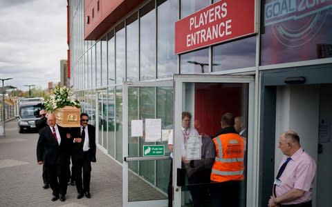 Barry Chuckle's coffin is carried into The New York Stadium in Rotherham - Credit: Christopher Furlong /Getty