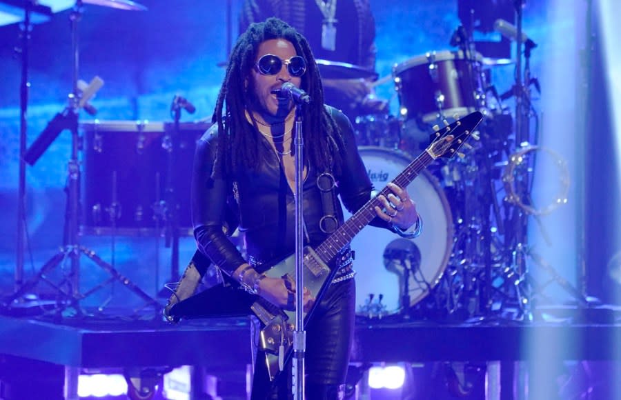 FILE – Lenny Kravitz performs at the iHeartRadio Music Awards on Monday, March 27, 2023, at the Dolby Theatre in Los Angeles. Kravitz is among the 2024 nominees for induction into the Rock & Roll Hall of Fame. (AP Photo/Chris Pizzello, File)