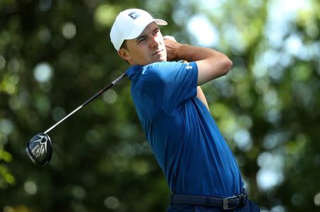 Jordan Spieth of the U.S. hits off the second tee during second round play of the 2018 Masters golf tournament at the Augusta National Golf Club in Augusta, Georgia, U.S., April 6, 2018. REUTERS/Lucy Nicholson