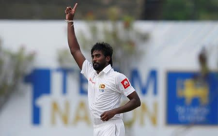 Cricket - Sri Lanka v India - First Test Match - Galle, Sri Lanka - July 26, 2017 - Sri Lanka's Nuwan Pradeep celebrates after taking the wicket of India's cricketer Abhinav Mukund (not pictured). REUTERS/Dinuka Liyanawatte