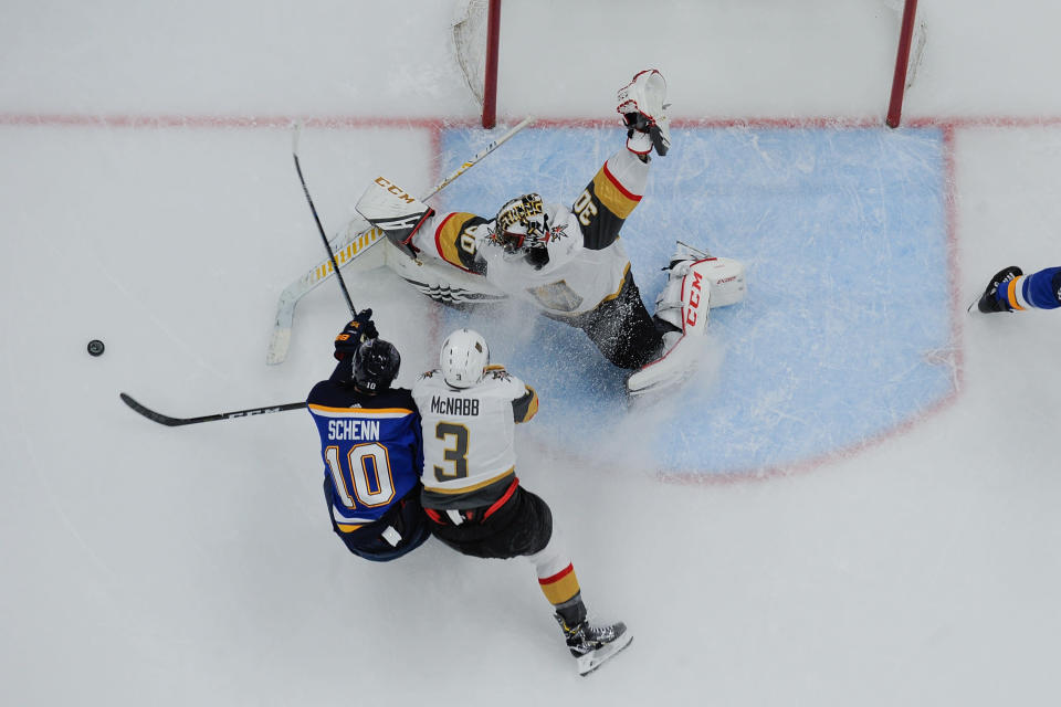 ST. LOUIS, MO - MARCH 25: Brayden McNabb #3 of the Vegas Golden Knights and Malcolm Subban #30 of the Vegas Golden Knights defend the net against Brayden Schenn #10 of the St. Louis Blues at Enterprise Center on March 25, 2019 in St. Louis, Missouri. (Photo by Joe Puetz/NHLI via Getty Images) 