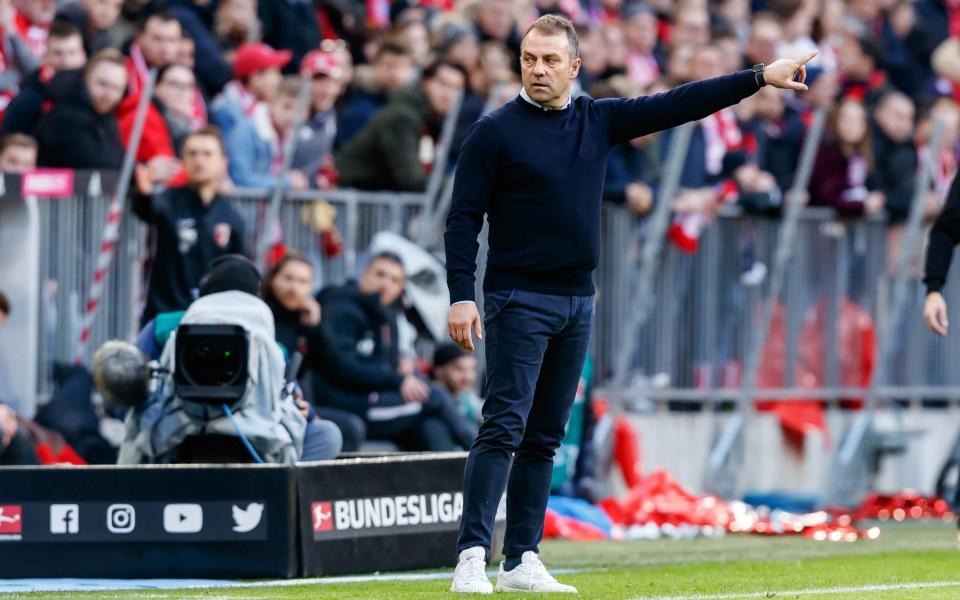 head coach Hansi Flick of Bayern Muenchen gestures during the Bundesliga match between FC Bayern Muenchen and FC Augsburg - GETTY IMAGES