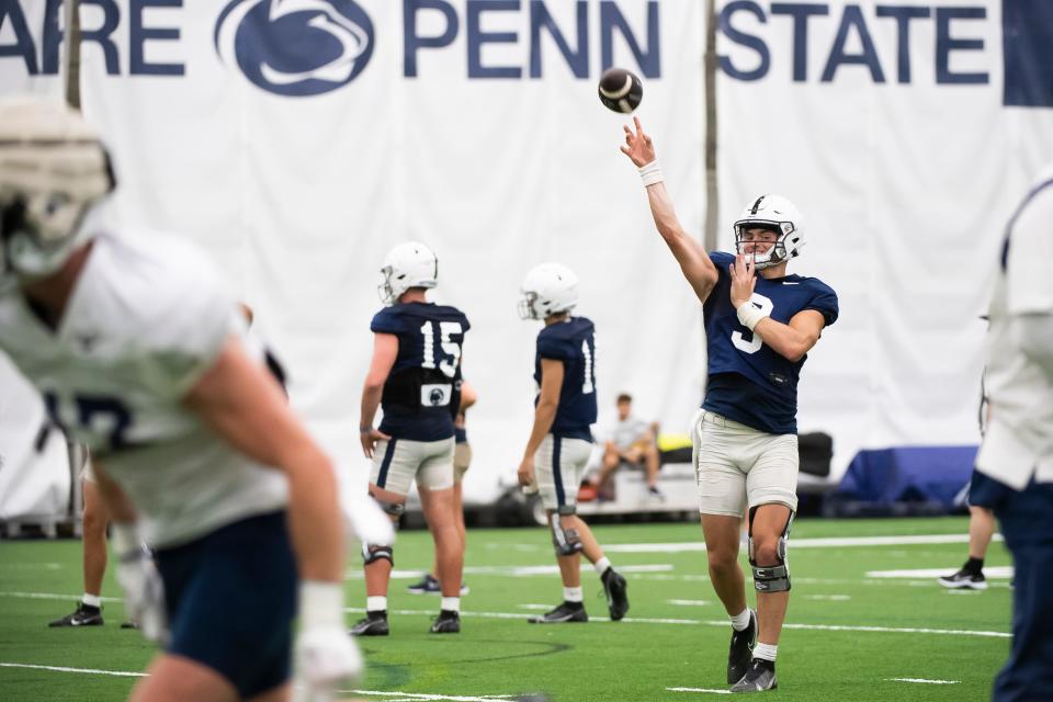 Penn State quarterback Beau Pribula airs out a pass during practice inside Holuba Hall on Sunday, August 6, 2023, in State College.