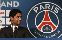 FILE - In this Wednesday, Jan. 29, 2014 file photo PSG President Nasser Al-Khelaifi smiles during a press conference, at the Parc des Princes stadium in Paris. In a verdict handed down Friday Oct. 30, 2020, Swiss federal judges acquitted the Qatari president of Paris Saint-Germain Nasser Al-Khelaifi. (AP Photo/Thibault Camus, File)