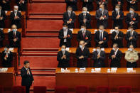 Chinese President Xi Jinping, left, gestures as he arrives for the opening session of the Chinese People's Political Consultative Conference (CPPCC) at the Great Hall of the People in Beijing, Thursday, May 21, 2020. (AP Photo/Andy Wong, Pool)