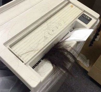 Hair caught in fax machine