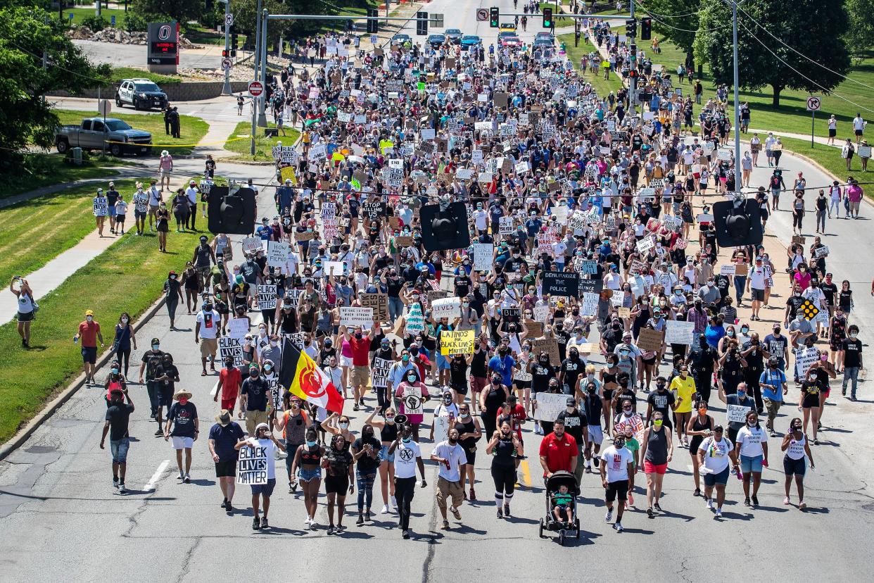 Crowds marched in memory of James Scurlock, who was killed in Omaha, Nebraska amid protests (AP)