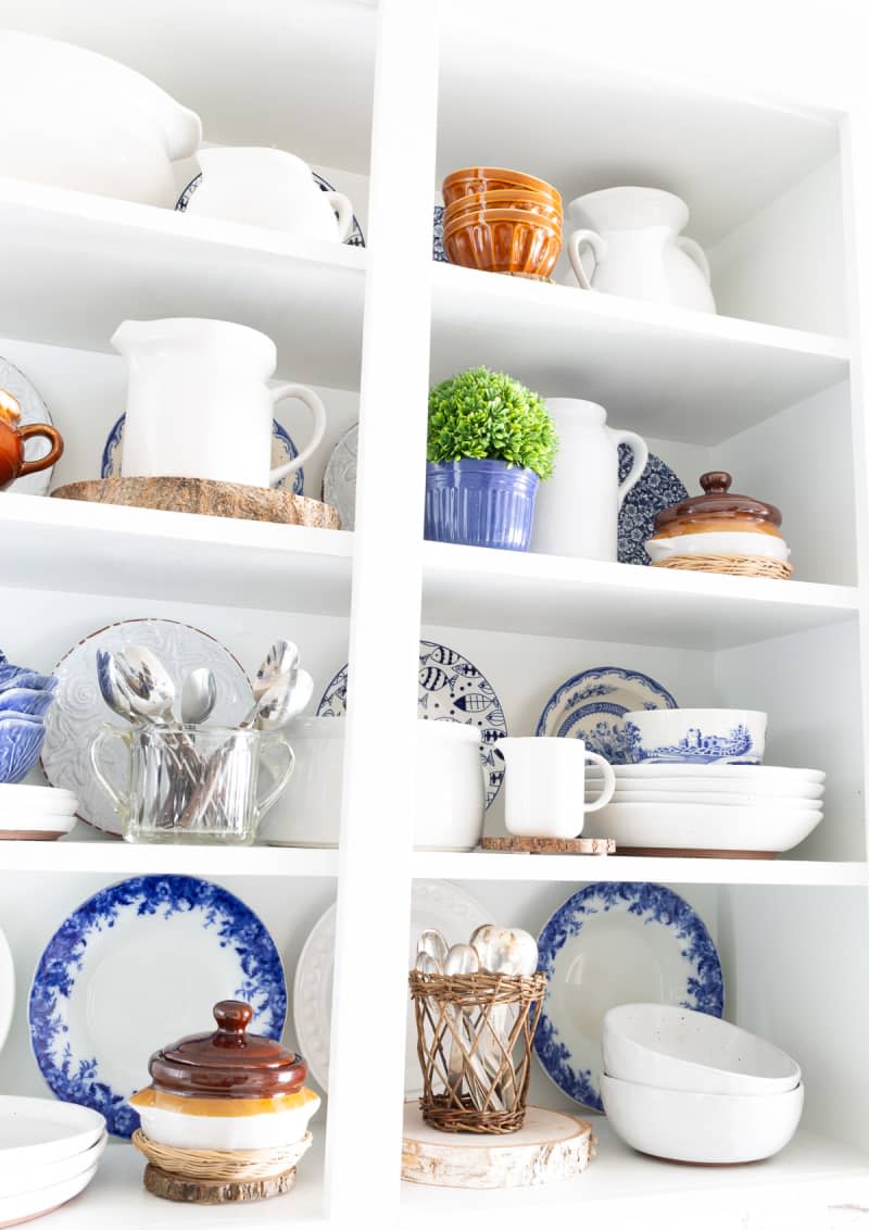 white open shelving in kitchen