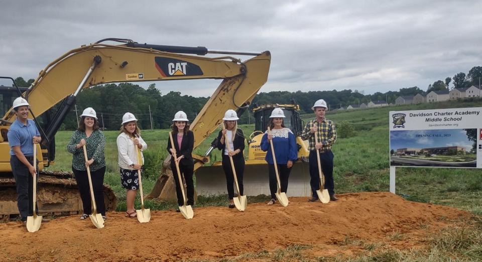 The groundbreaking of the Davidson Charter Academy Middle School. Pictured are DCA board members Andrew Lance (left), Kristin Briggs, Christine England, Jennifer Flury, DCA Director of Business Operations; Lori James, DCA Director of Education; Amanda Whitaker, DCA Board
and Greg Turlington, DCA Board.