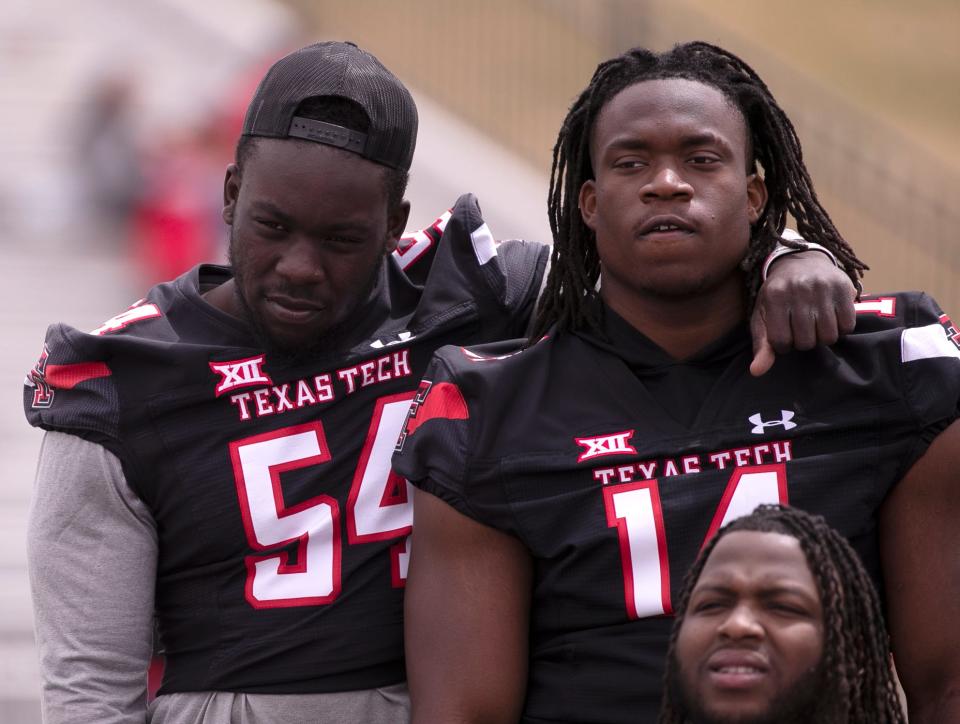 Texas Tech's linebacker Bryce Ramirez (54) and Texas Tech's Joseph Adedire huddle after Spring Game, Saturday, April 22, 2023, at Lowrey Field at PlainsCapital Park. 