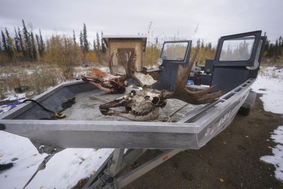 A boat sits Thursday, Sept. 23, 2021, in Tanacross, Alaska. Tanacross, a village of about 140 residents, has recorded only one death, and only about 20 residents contracted the virus during the pandemic. Alaska is experiencing one of the sharpest rises in COVID-19 cases in the country, coupled with a limited statewide healthcare system that is almost entirely reliant on Anchorage hospitals. (AP Photo/Rick Bowmer)