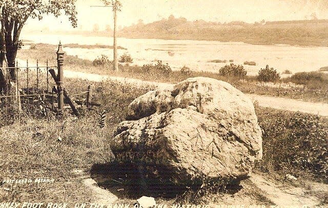 A 1908 postcard shows the original location of Turkey Foot Rock near the Maumee River in Lucas County. The rock is now part of the Fallen Timbers State Memorial.