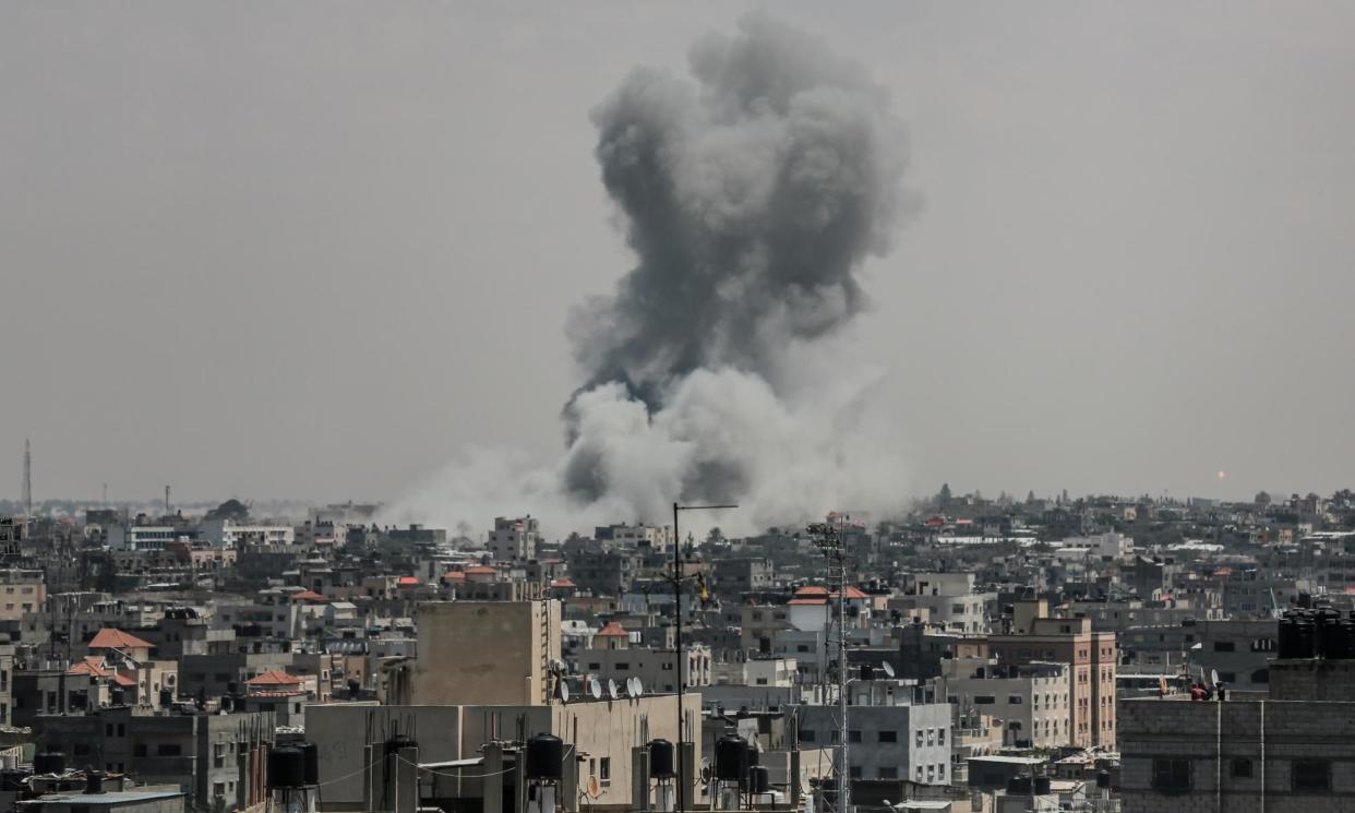 <span>Smoke rises following an Israeli airstrike on Rafah.</span><span>Photograph: Anadolu/Getty Images</span>