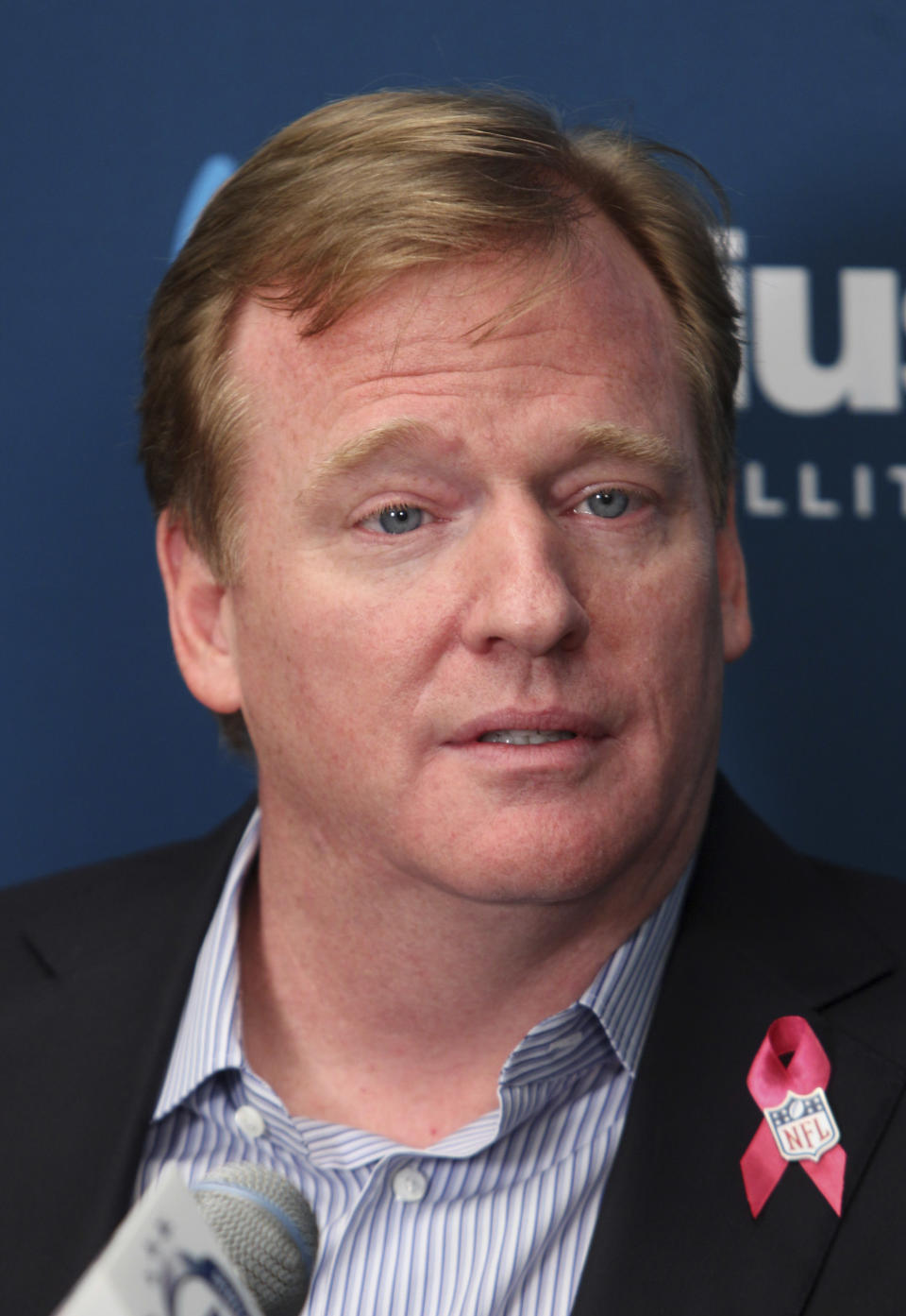 NFL Commissioner Roger Goodell talks with former New York Giants' Michael Strahan and football fans during a Sirius XM town hall, Monday, Oct. 22, 2012, in New York. (AP Photo/Seth Wenig)