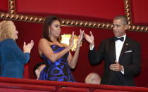 U.S. President Barack Obama and first lady Michelle Obama (C) attend the Kennedy Center Honors at the Kennedy Center in Washington December 6, 2015. REUTERS/Yuri Gripas