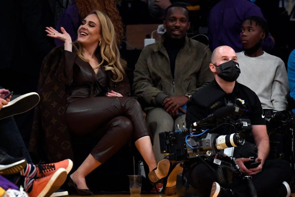 Adele waves to fans at the Staples Center in Los Angeles  (Getty Images)