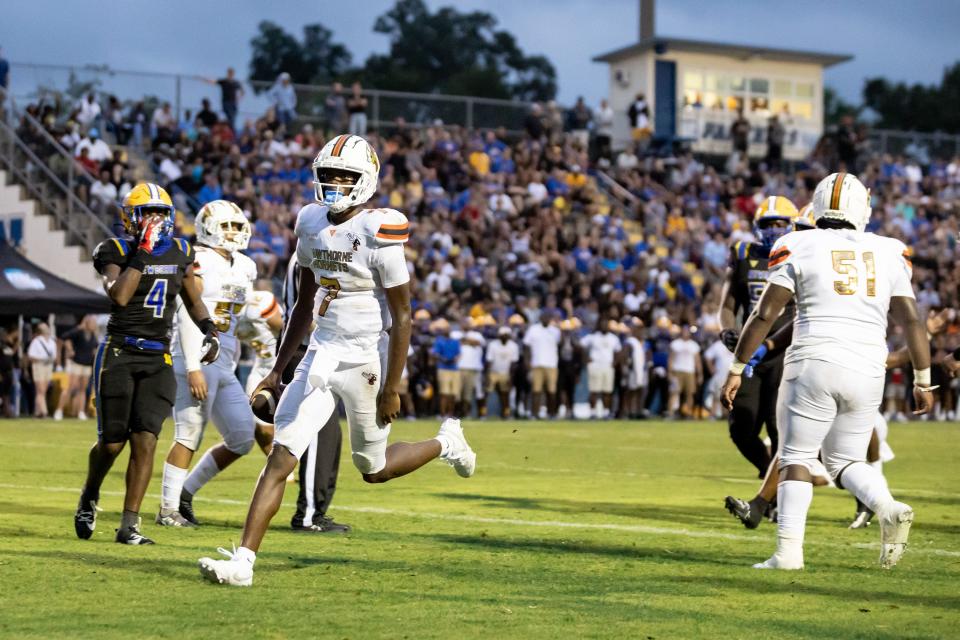 Hawthorne Hornets quarterback CJ Ingram (7) scores a touchdown during the first half against the Newberry Panthers at Newberry High School in Newberry, FL on Friday, September 1, 2023. [Matt Pendleton/Gainesville Sun]