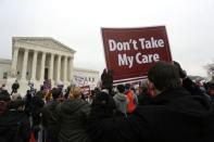 Demonstrators in favor of Obamacare gather at the Supreme Court building in Washington March 4, 2015. REUTERS/Jonathan Ernst