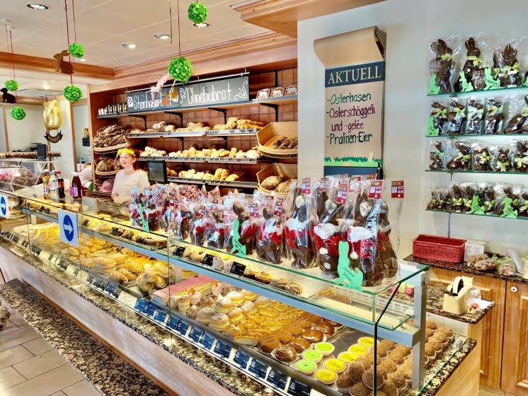 Bohnenblust bakery in Bern, Switzerland, displays chocolate Easter bunnies wearing face masks.