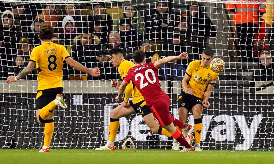 Liverpool’s Diogo Jota sees his shot blocked on the line by Wolves’ Conor Coady (right), Nigel French (PA Images). (PA Wire)