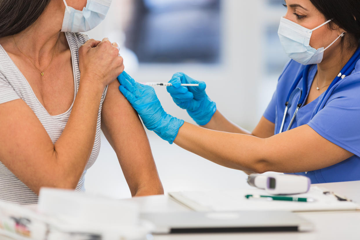 A woman receives the COVID-19 booster. (Getty Images)