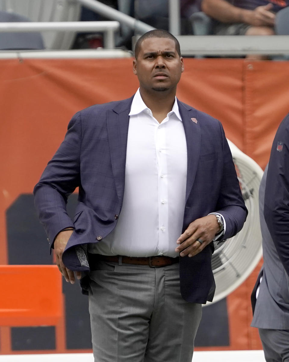 Chicago Bears first-year general manager Ryan Poles watches warm ups before an NFL preseason football game between the Bears and the Kansas City Chiefs Saturday, Aug. 13, 2022, in Chicago. (AP Photo/David Banks)