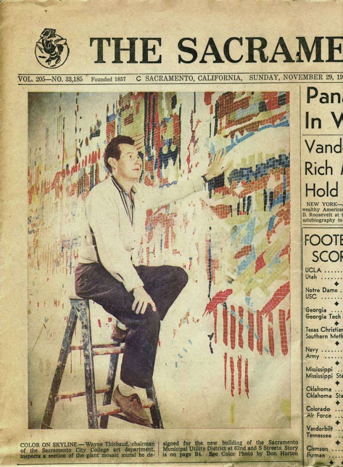 Artist Wayne Theibaud examines his mosaic mural for the new Sacramento Municipal Utility District building in 1959.