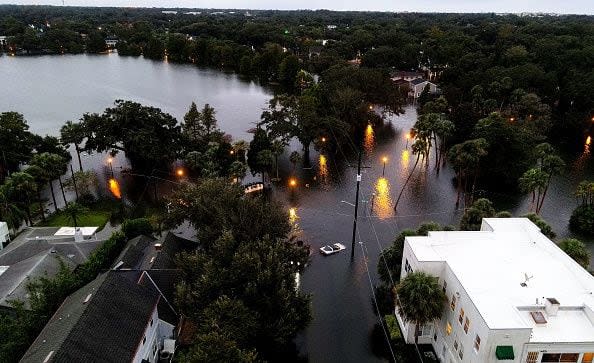 In this aerial view, a neighborhood remains flooded near downtown after Hurricane Ian on September 29, 2022, in Orlando, Florida.