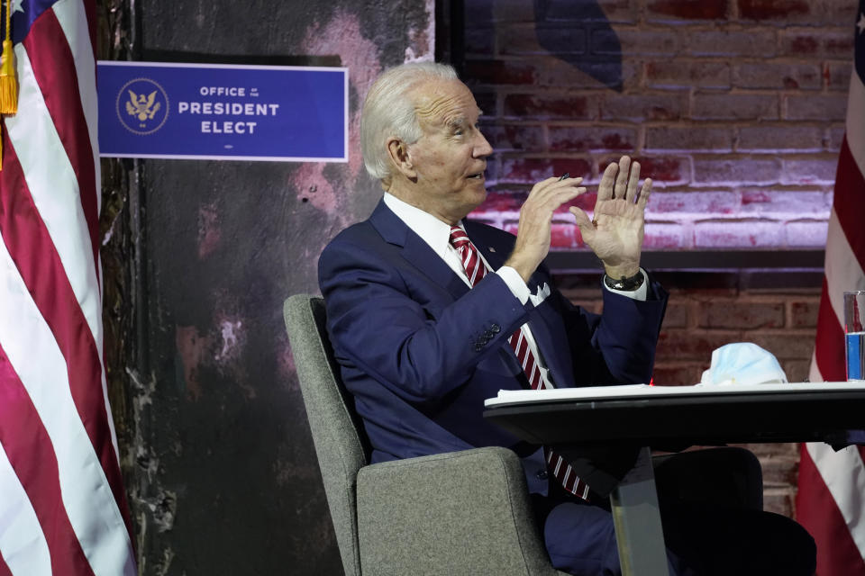 President-elect Joe Biden and Vice President-elect Kamala Harris attend a briefing on the economy at The Queen theater, Monday, Nov. 16, 2020, in Wilmington, Del. (AP Photo/Andrew Harnik)