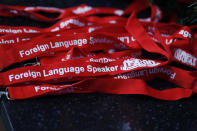 Lanyards stand at the ready for volunteers who speak foreign languages to wear while answering telephones in the NORAD Tracks Santa center at Peterson Air Force Base, Monday, Dec. 23, 2019, in Colorado Springs, Colo. More than 1,500 volunteers will answer an estimated 140,000 calls from children and their parents from around the globe to check on the whereabouts of Santa Claus on Christmas Eve. (AP Photo/David Zalubowski)