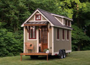 <body> <p>If you can't buy the farm, you can at least get the farmhouse—or at least this wee little elfin version from Timbercraft Tiny Homes that you can take with you wherever you go. Boasting a <a rel="nofollow noopener" href=" http://www.bobvila.com/slideshow/12-design-essentials-for-the-perfect-country-kitchen-47537?bv=yahoo" target="_blank" data-ylk="slk:cozy kitchen;elm:context_link;itc:0;sec:content-canvas" class="link ">cozy kitchen</a>, bedroom, and loft as well as a porch with a rustic cedar awning, this customizable one-story on wheels packs all the hallmarks of bona fide country living into less than 335 square feet.</p> <p><strong>Related: <a rel="nofollow noopener" href=" http://www.bobvila.com/slideshow/22-tiny-houses-we-love-33953#.WD-pHqIrKRs?bv=yahoo" target="_blank" data-ylk="slk:22 Houses We Love;elm:context_link;itc:0;sec:content-canvas" class="link ">22 Houses We Love</a> </strong> </p> </body>