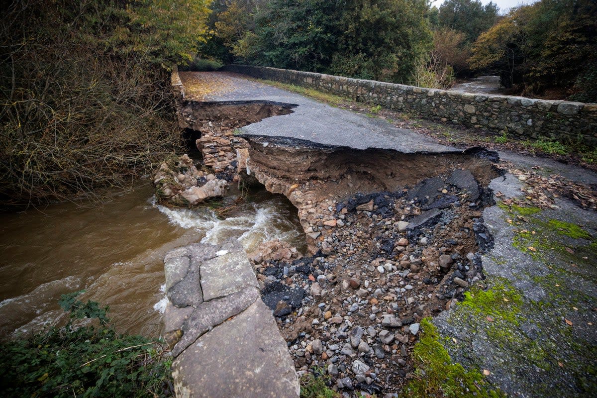 The River Big Bridge, outside Carlingford, Ireland, collapsed overnight with heavy rain fall and flooding (PA)